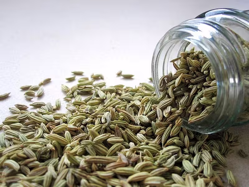  clear glass fennel seeds jar laying on a floor